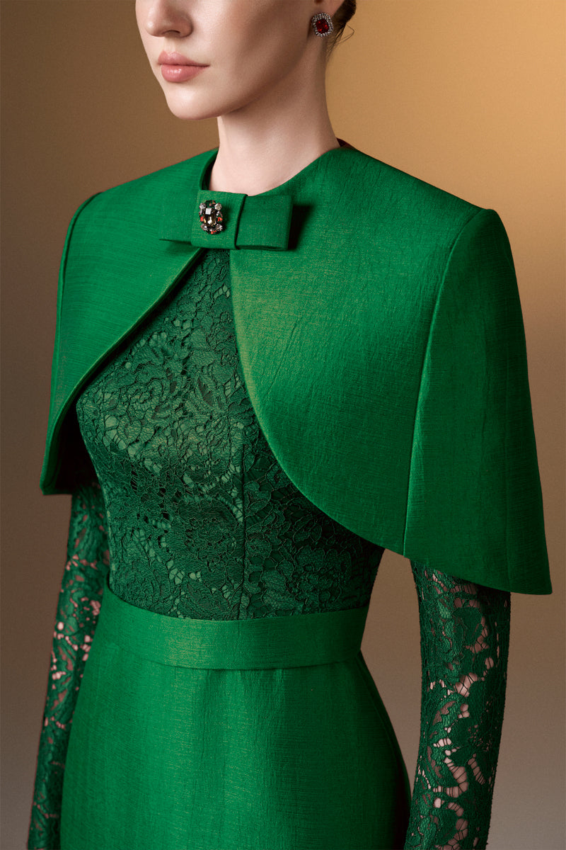 Round Neck Column Gown With With Long Sleeves And Mini Cape In Green Bamboo Taffeta And French Lace