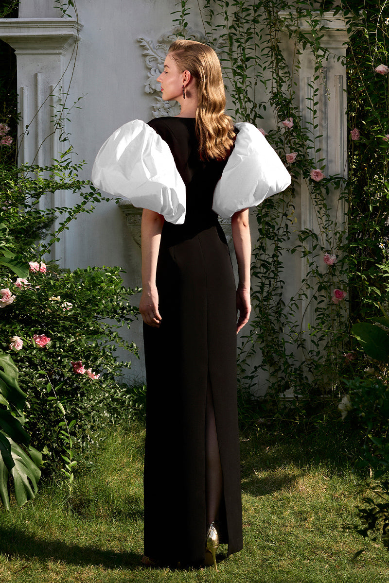 COLUMN EVENING GOWN WITH TRAPEZE NECKLINE AND DRAPED SHORT SLEEVES