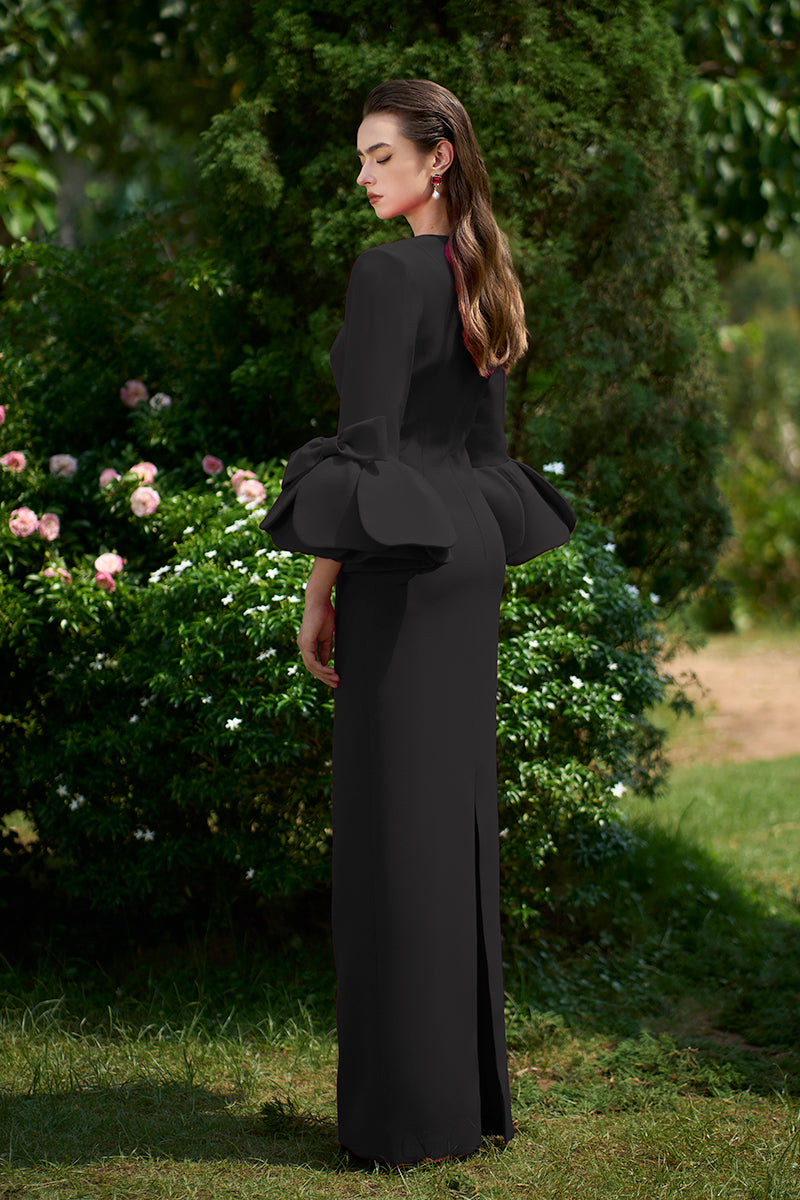 COLUMN EVENING GOWN WITH TRAPEZE NECKLINE AND ROSE DRAPED THREE-QUARTER SLEEVES