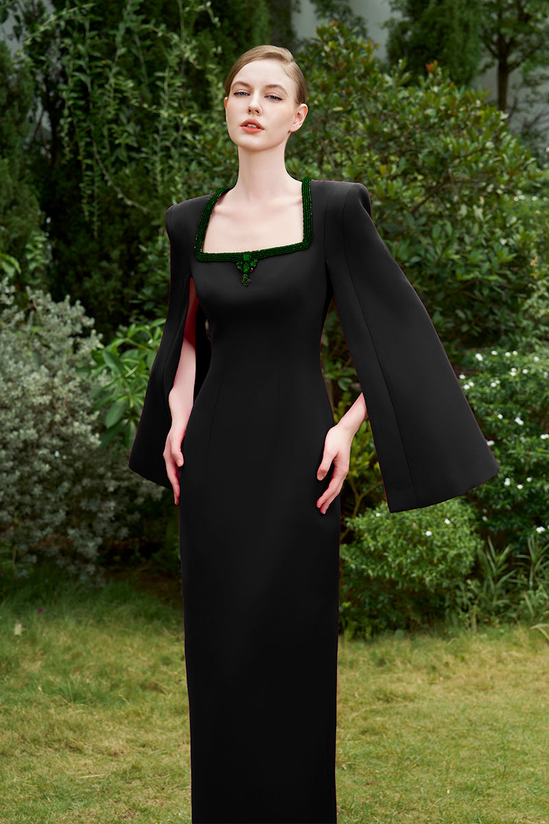 COLUMN EVENING GOWN WITH TRAPEZE NECKLINE AND LONG SLIT SLEEVES