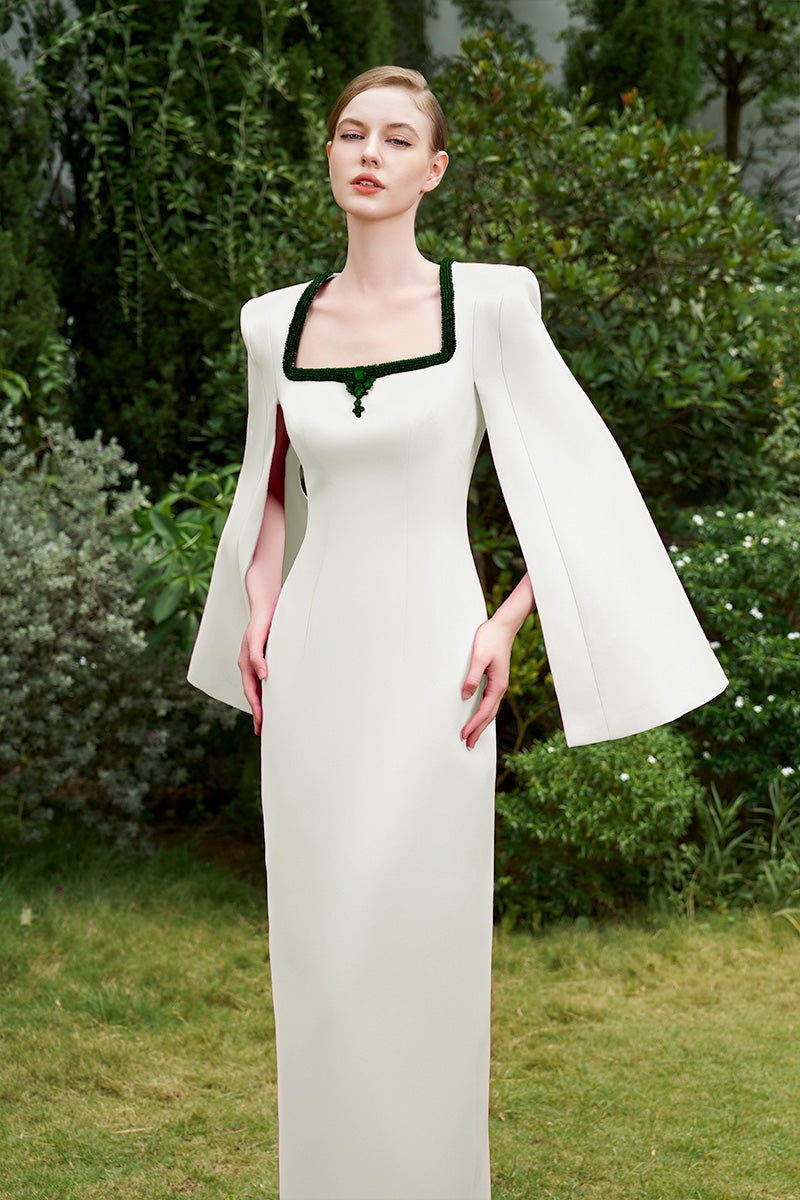 COLUMN EVENING GOWN WITH TRAPEZE NECKLINE AND LONG SLIT SLEEVES