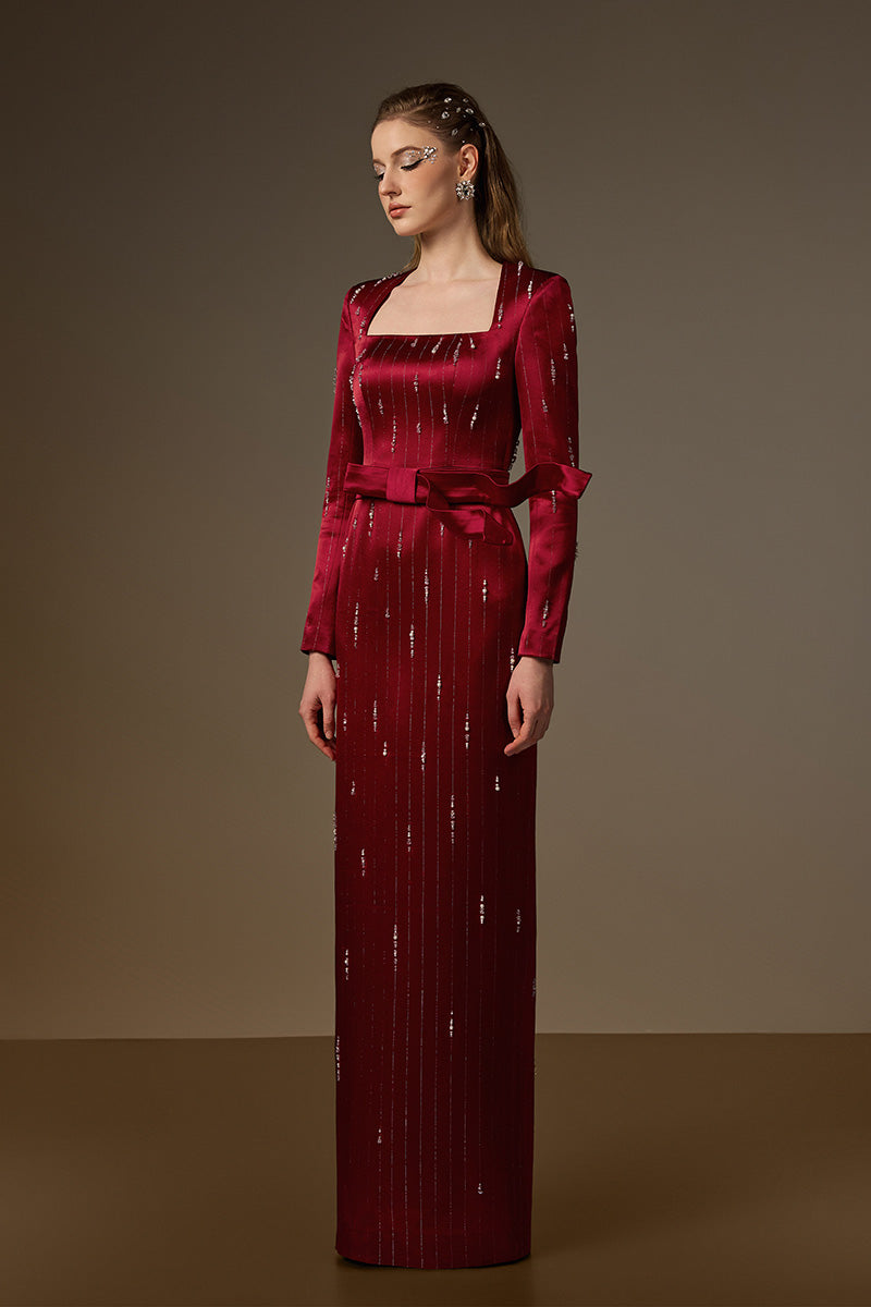 Trapeze Neck Column Gown With Belt Resembling A Wind-Blown Train In Red Metallic Striped Silk