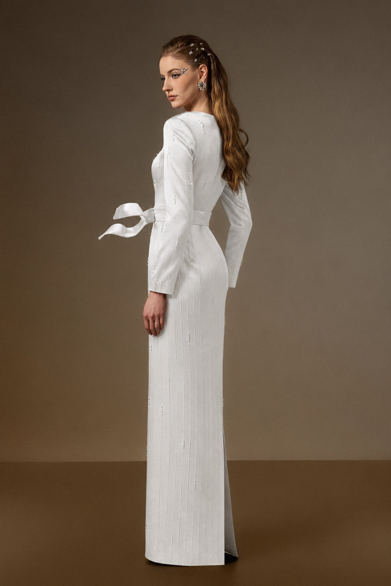 Trapeze Neck Column Gown With Belt Resembling A Wind-Blown Train In White Metallic Striped Silk