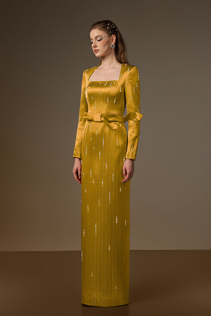Trapeze Neck Column Gown With Belt Resembling A Wind-Blown Train In Yellow Metallic Striped Silk