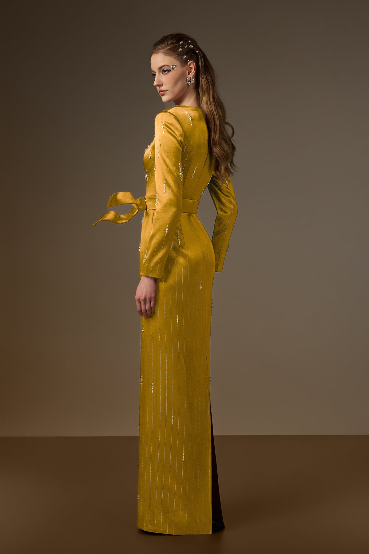Trapeze Neck Column Gown With Belt Resembling A Wind-Blown Train In Yellow Metallic Striped Silk