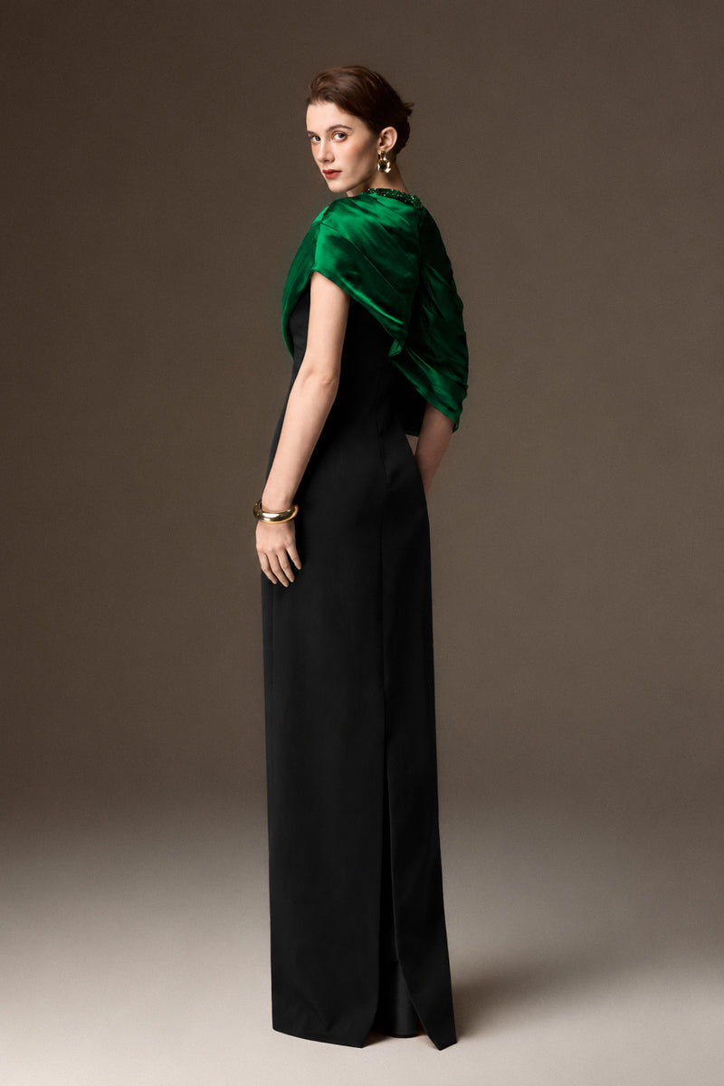 Round Neck Column Gown With Asymmetric Cape In Dark Green Satin Silk And Black Crepe
