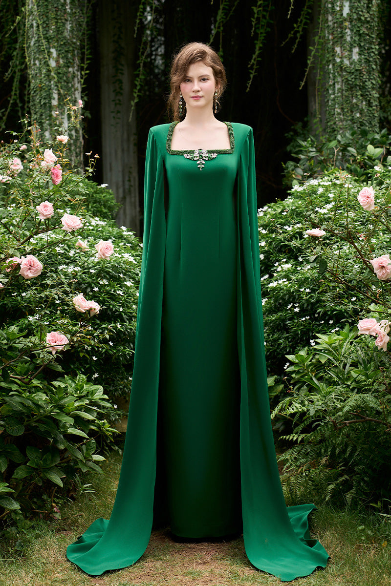 Column Evening Gown With Trapeze Neckline And Attached Long Cape