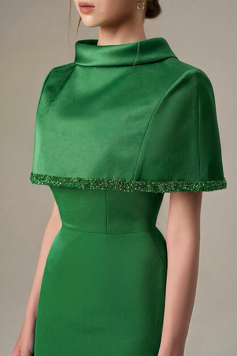Green Taffeta Dress With A Cropped Cape And Inverted Lapel