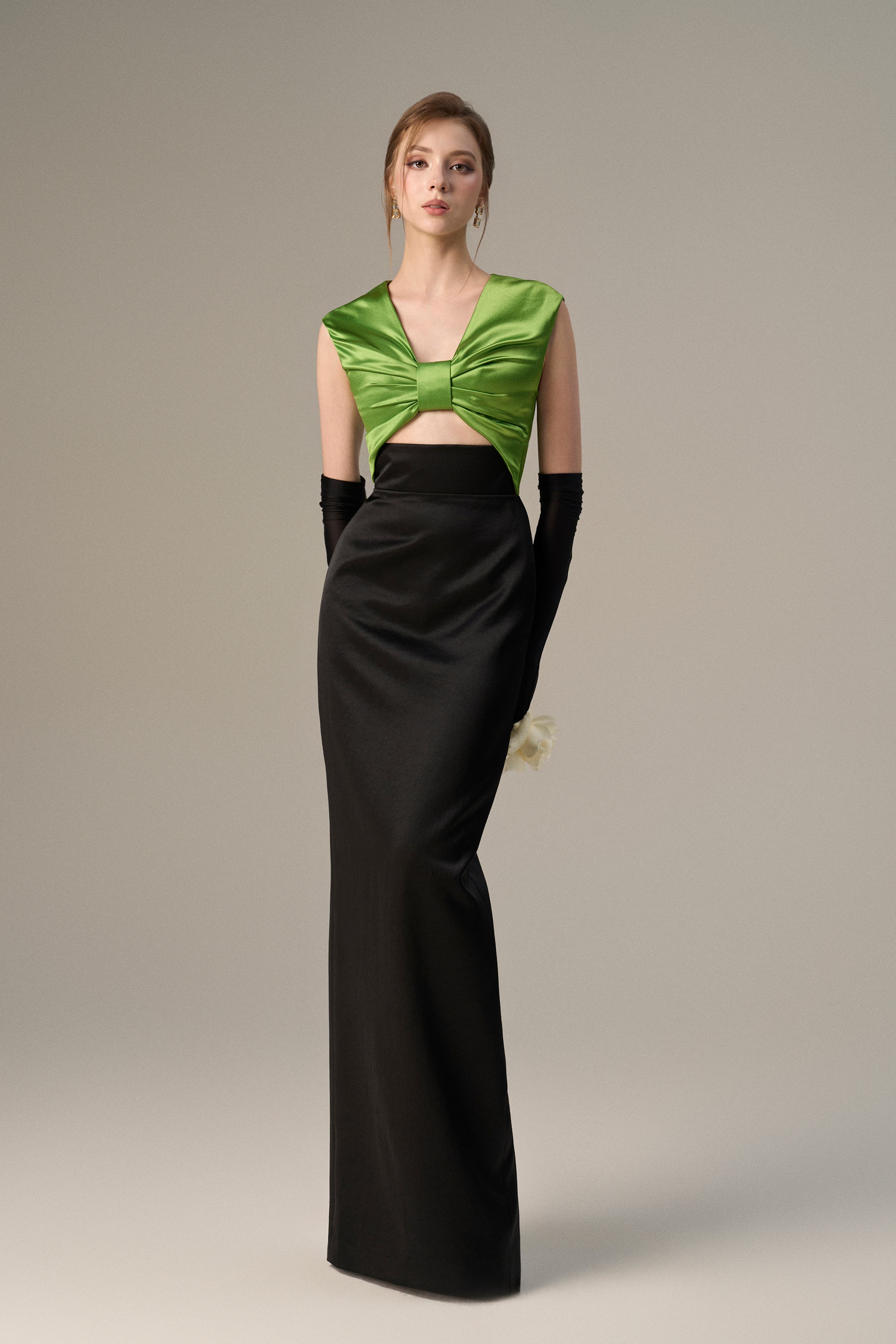 Black Taffeta Gown With A Statement Bow, Cut-out, And Satin Silk Accents
