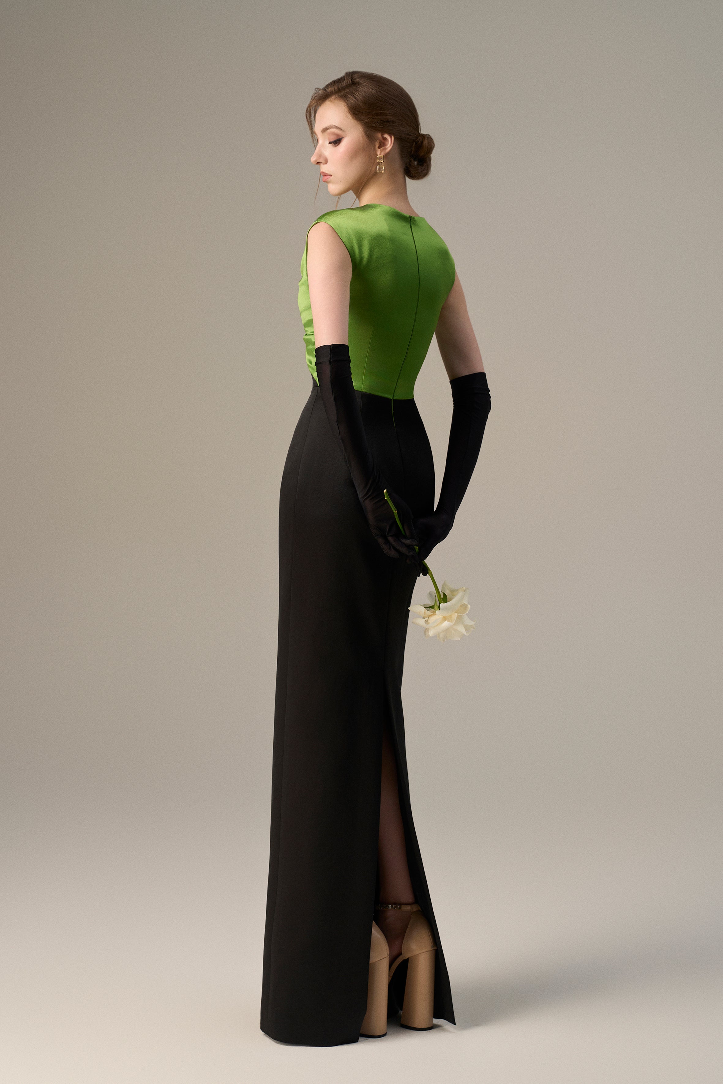 Black Taffeta Gown With A Statement Bow, Cut-out, And Satin Silk Accents