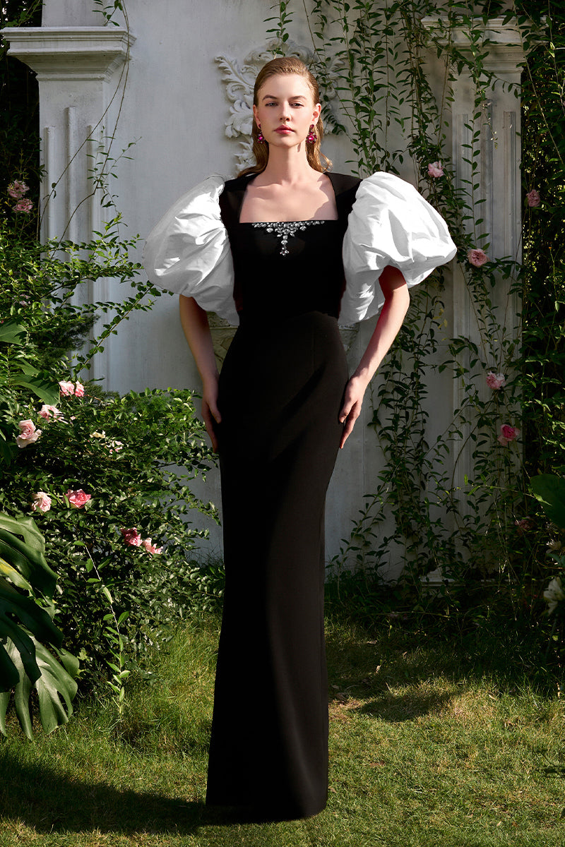 COLUMN EVENING GOWN WITH TRAPEZE NECKLINE AND DRAPED SHORT SLEEVES
