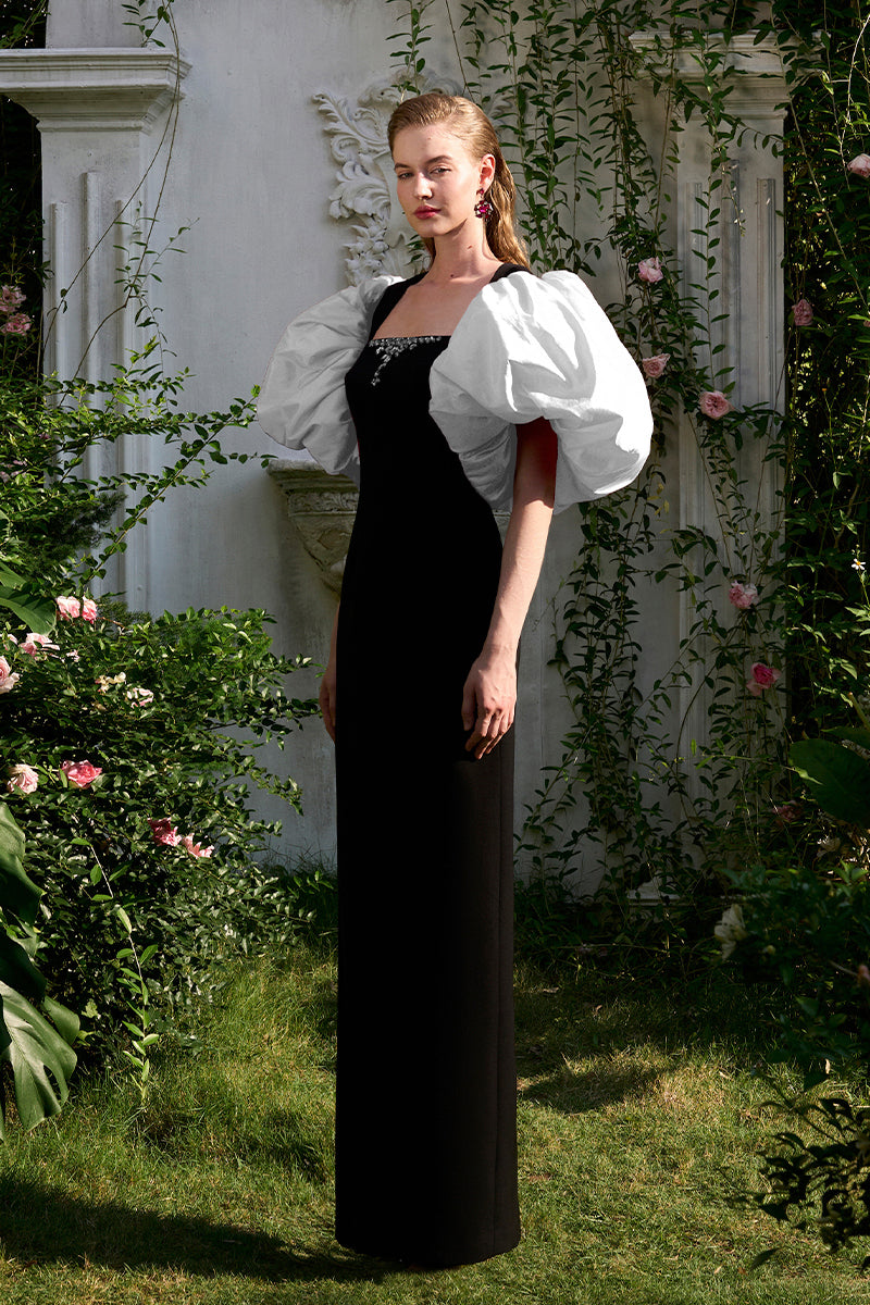 COLUMN EVENING GOWN WITH TRAPEZE NECKLINE AND DRAPED SHORT SLEEVES