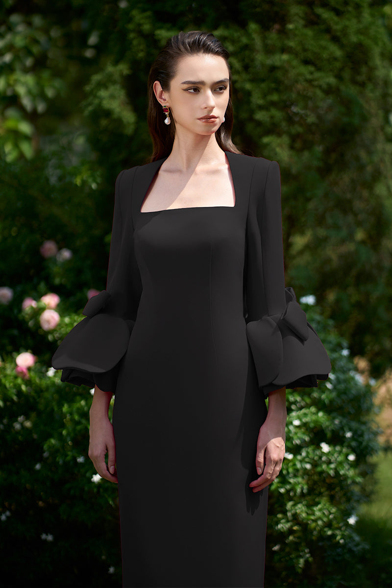 COLUMN EVENING GOWN WITH TRAPEZE NECKLINE AND ROSE DRAPED THREE-QUARTER SLEEVES