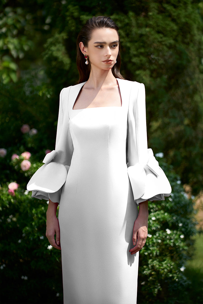 COLUMN EVENING GOWN WITH TRAPEZE NECKLINE AND ROSE DRAPED THREE-QUARTER SLEEVES