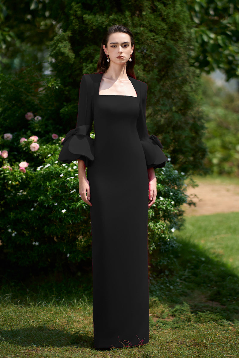 COLUMN EVENING GOWN WITH TRAPEZE NECKLINE AND ROSE DRAPED THREE-QUARTER SLEEVES