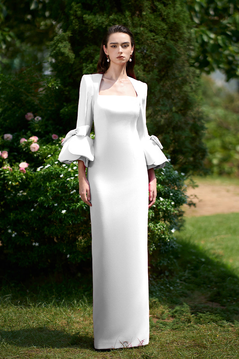 COLUMN EVENING GOWN WITH TRAPEZE NECKLINE AND ROSE DRAPED THREE-QUARTER SLEEVES