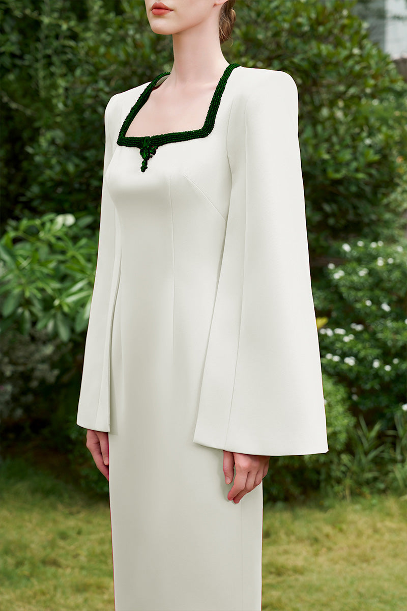 COLUMN EVENING GOWN WITH TRAPEZE NECKLINE AND LONG SLIT SLEEVES