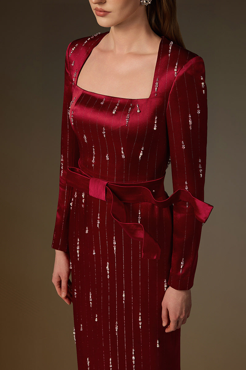 Trapeze Neck Column Gown With Belt Resembling A Wind-Blown Train In Red Metallic Striped Silk
